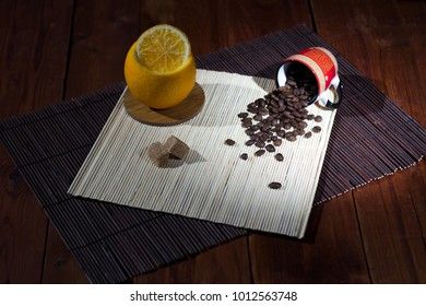 sugar brownie with grain coffee on a black background and orange turkey