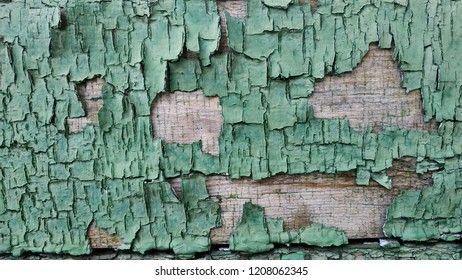wood texture with green peeled paint