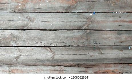wood texture with red peeled paint