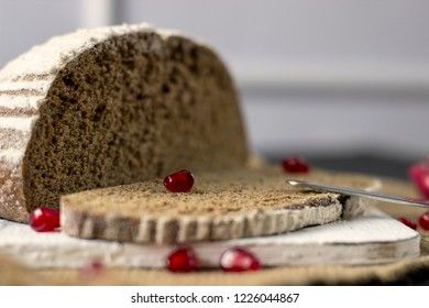 black rye bread with pomegranate seeds