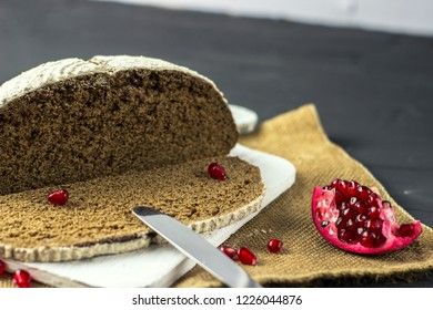 black rye bread with pomegranate seeds