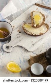 Pieces of bread with butter and honey