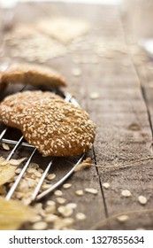 Oatmeal cookies on tray on rustic wooden table