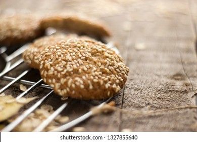 Oatmeal cookies with milk on tray on rustic wooden table