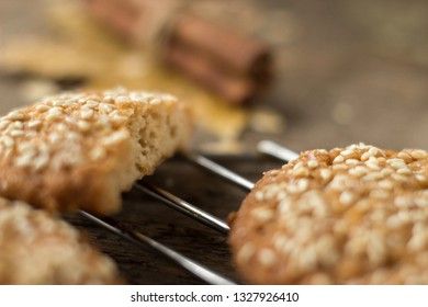 Oatmeal cookies on tray on rustic wooden table, macro.
