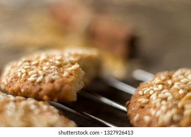 Oatmeal cookies on tray on rustic wooden table, macro