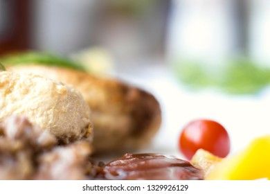 Chicken cutlets with buckwheat, herbs, ketchup and tomatoes