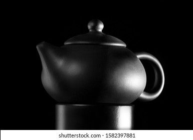 clay ceramic chinese teapot in a low key