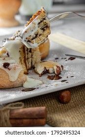 original cinnabon rolls with chocolate-cream sauce and hazelnuts